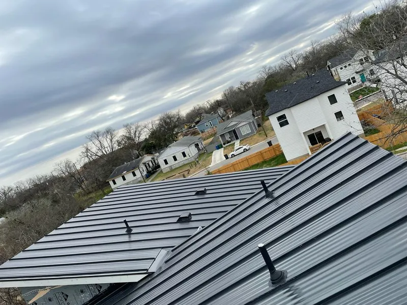 Standing seam metal roof panels with vents for Skylight Repair in Concord